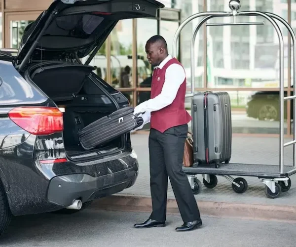 imgi_49_doorman-uniform-taking-suitc